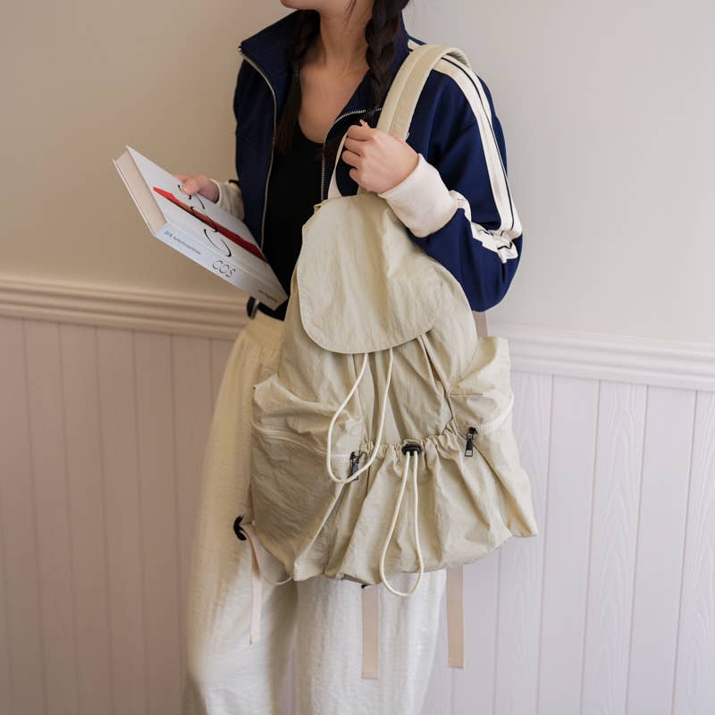 Fashionable pleated large-capacity flip schoolbag