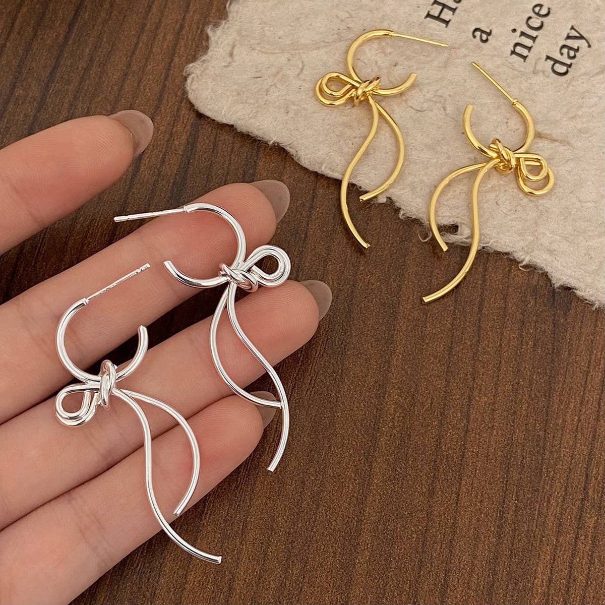 FASHIONABLE HIGH-GRADE METAL BOW PENDANT EARRINGS