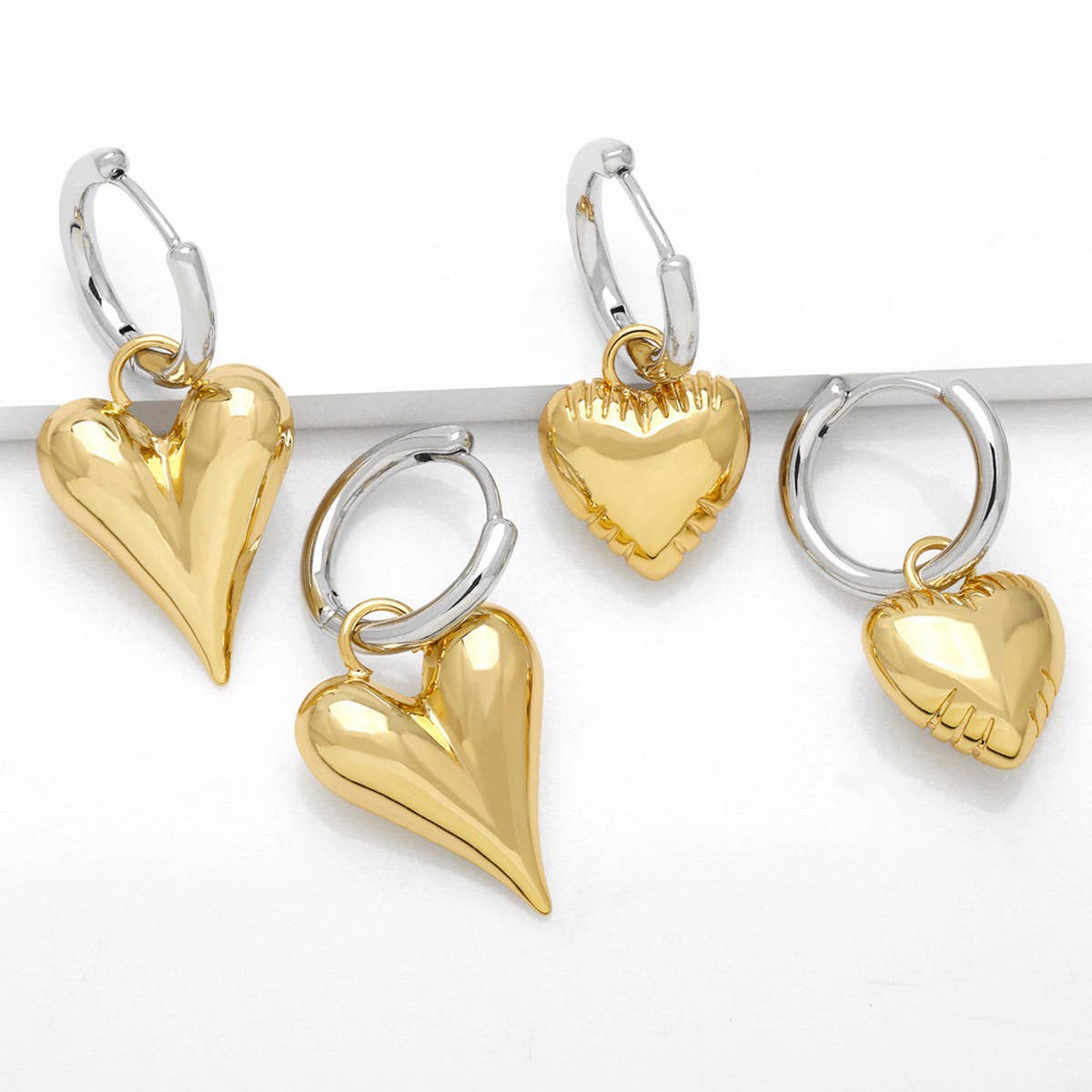 GOLD PLATED HEART-SHAPED PENDANT EARRINGS