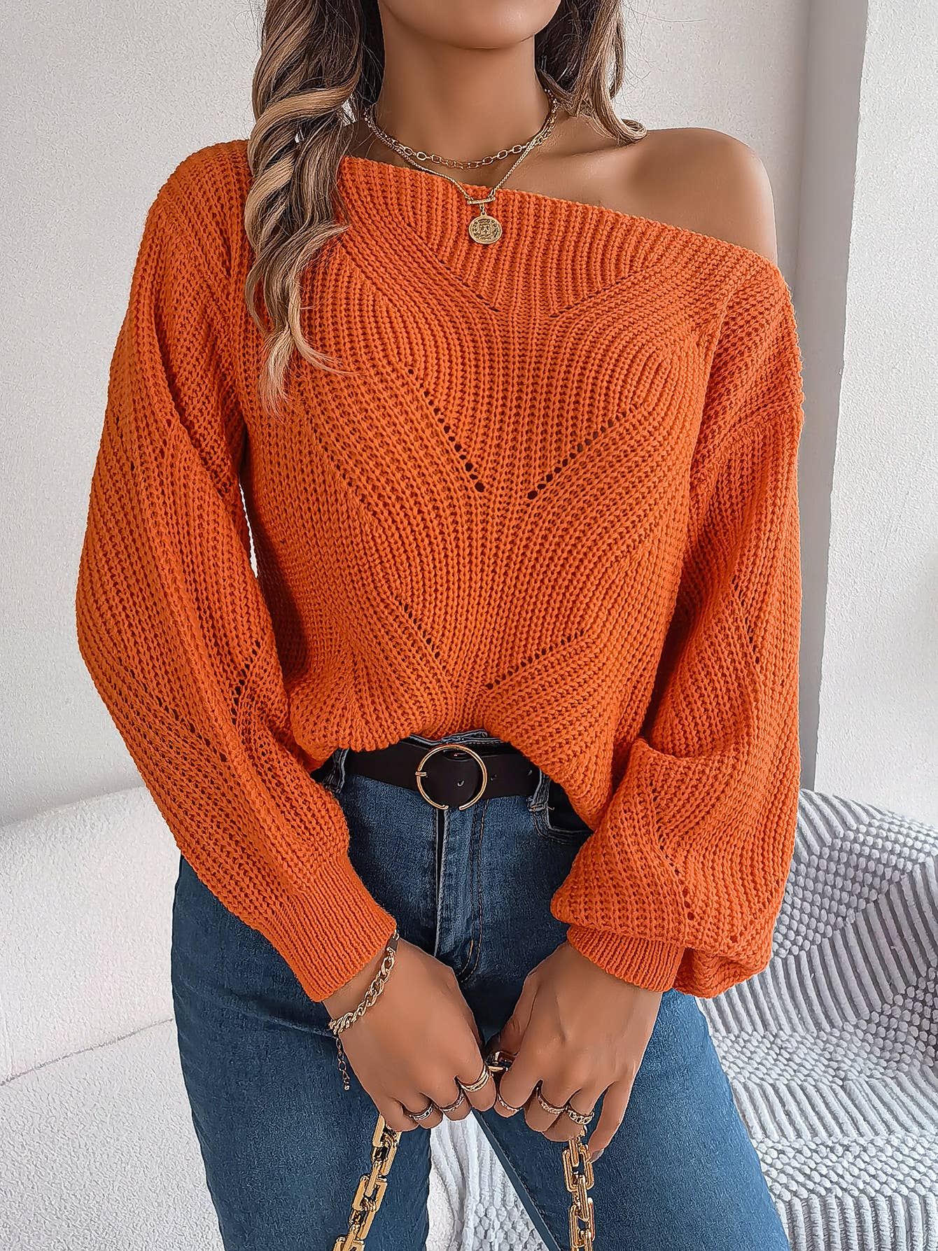 Cut-out one-line collar long-sleeved sweater