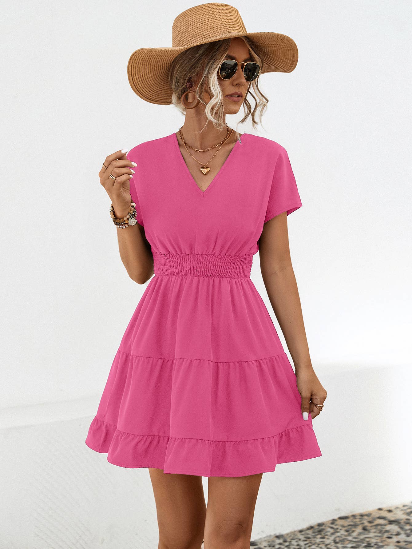 A V-neck solid color cinched short dress