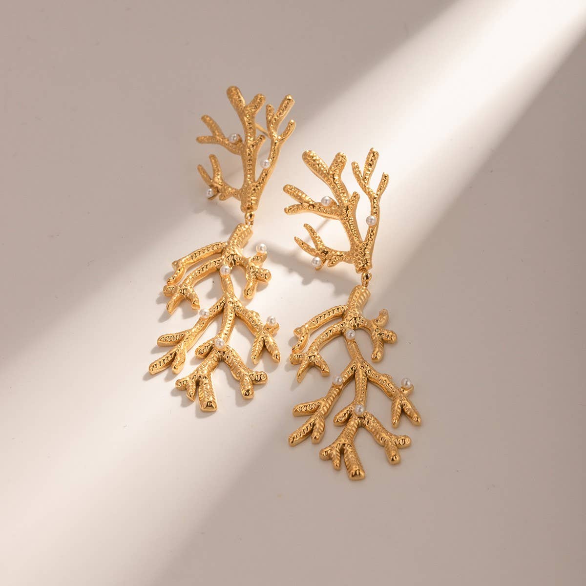FASHIONABLE PEARL TEXTURE CORAL SHAPED EARRINGS