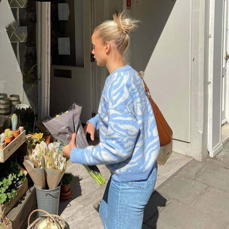 ANIMAL PRINT PULLOVER WITH LOOSE COLLAR