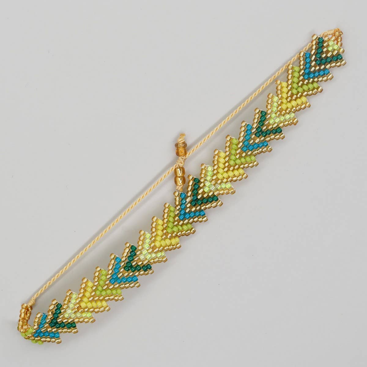 RICE BEAD HAND-WOVEN RAINBOW FLOWER BRACELET