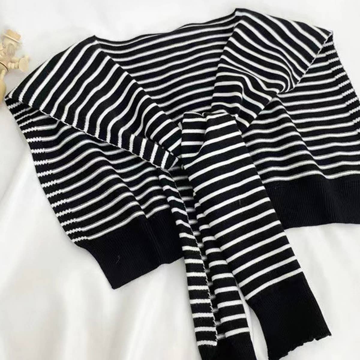 Accessorize with a striped cape