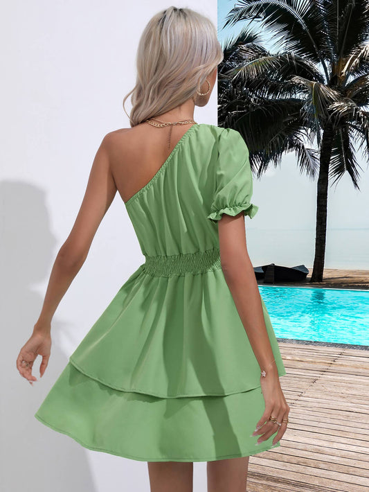 Dress with sloping shoulders and waist