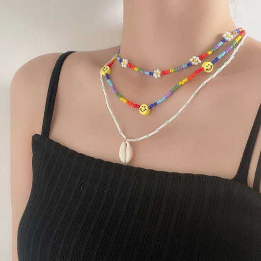 SHELL SMILEY DAISY BRAIDED NECKLACE