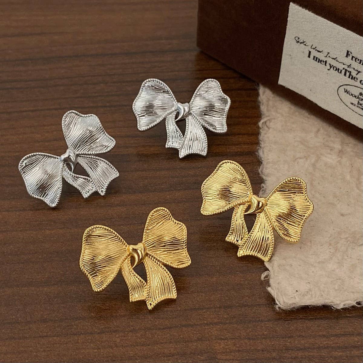 NEW SIMPLE TEMPERAMENT BOW EARRINGS FOR WOMEN