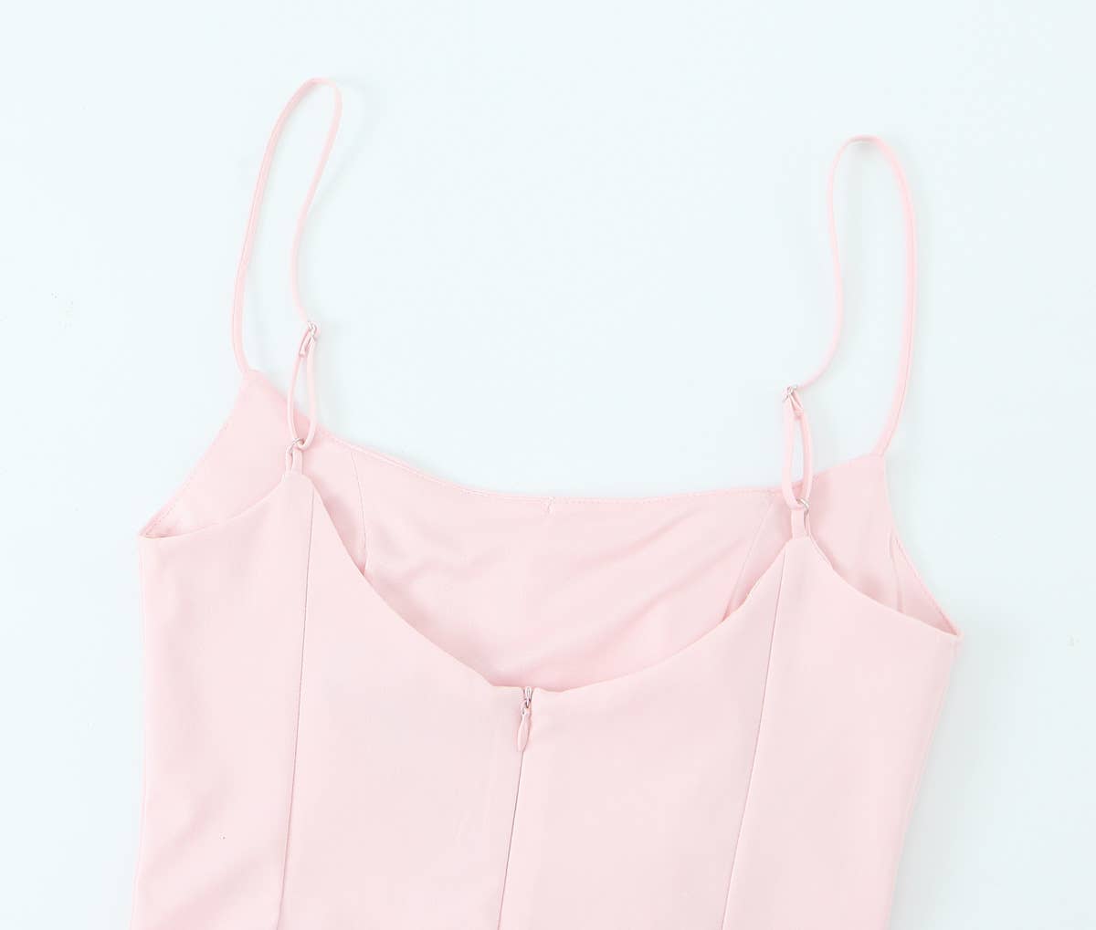 A short halter dress with striped patchwork