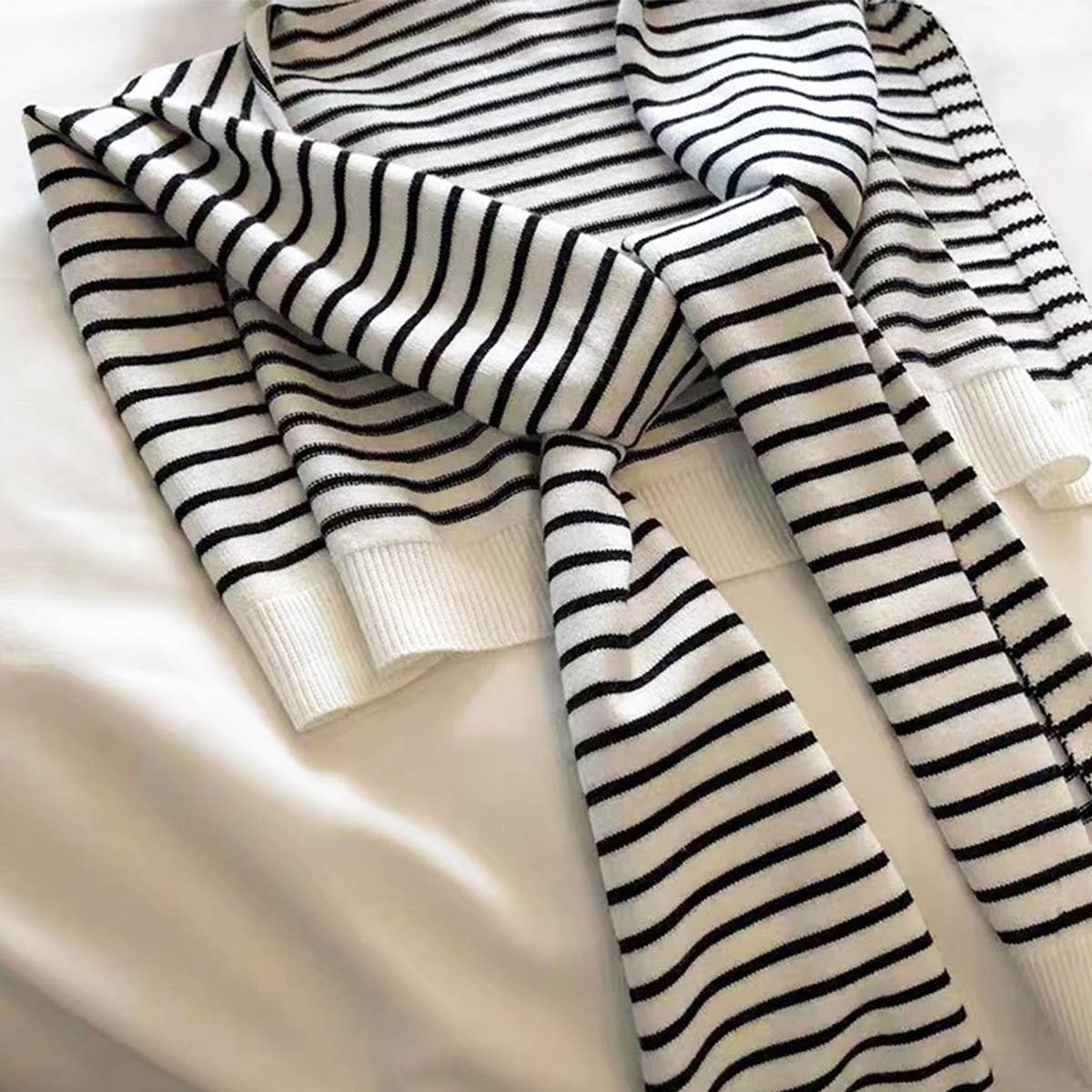 Accessorize with a striped cape