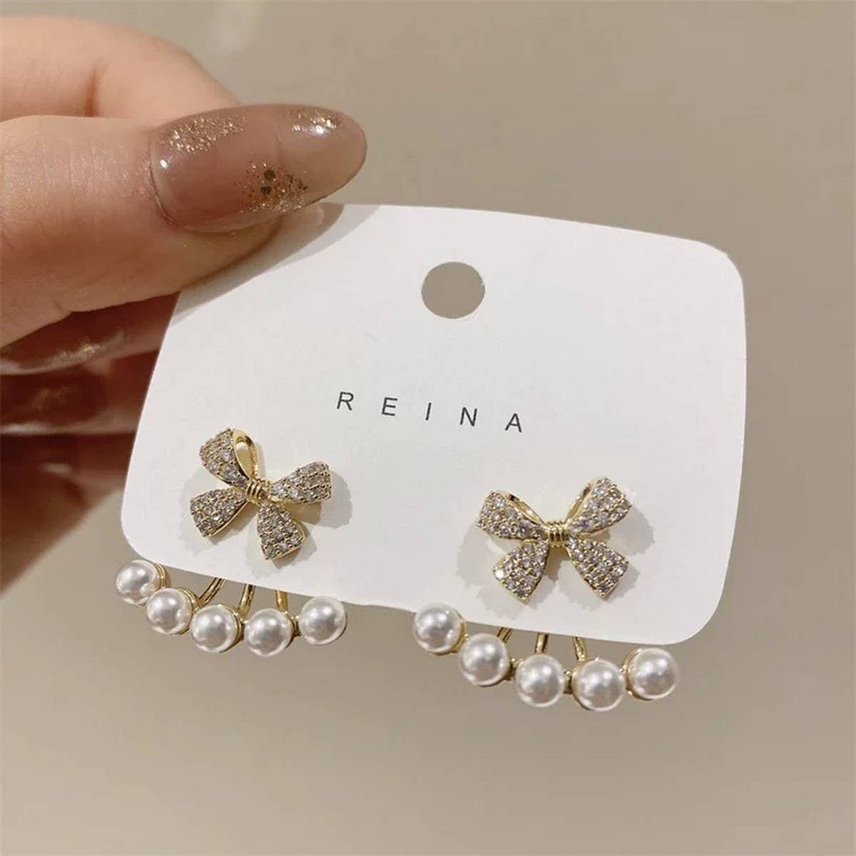 SWEET PEARL INLAID BOW ONE PAIR TWO WEAR EARRINGS