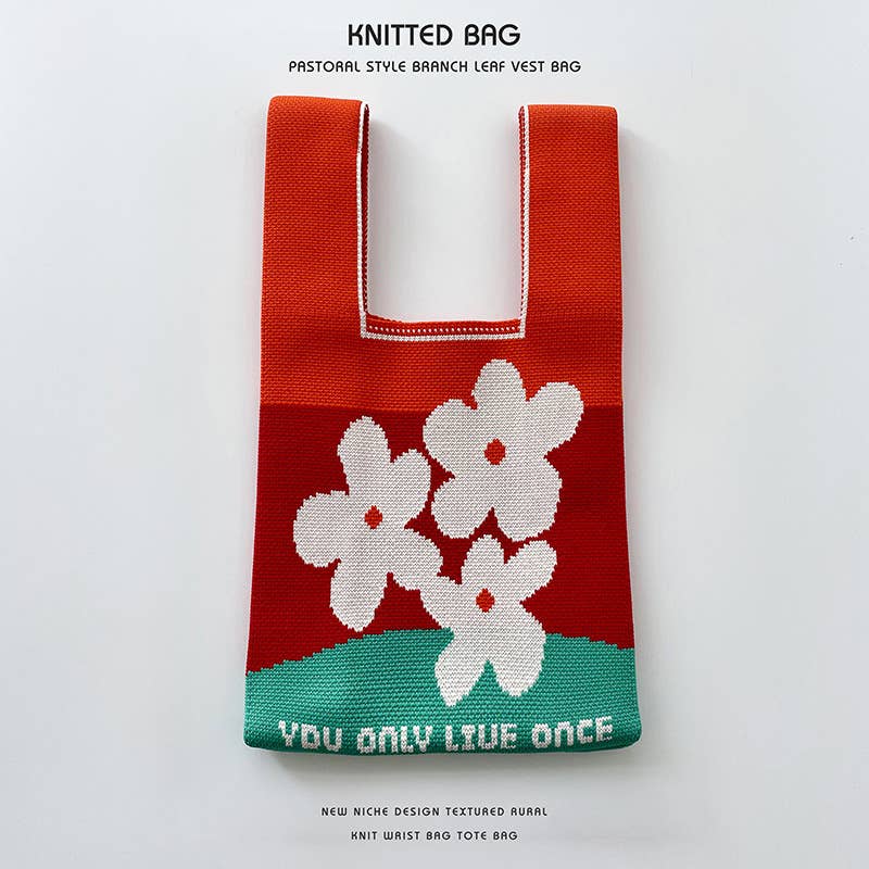 Heart-shaped color-blocked knitted handbag