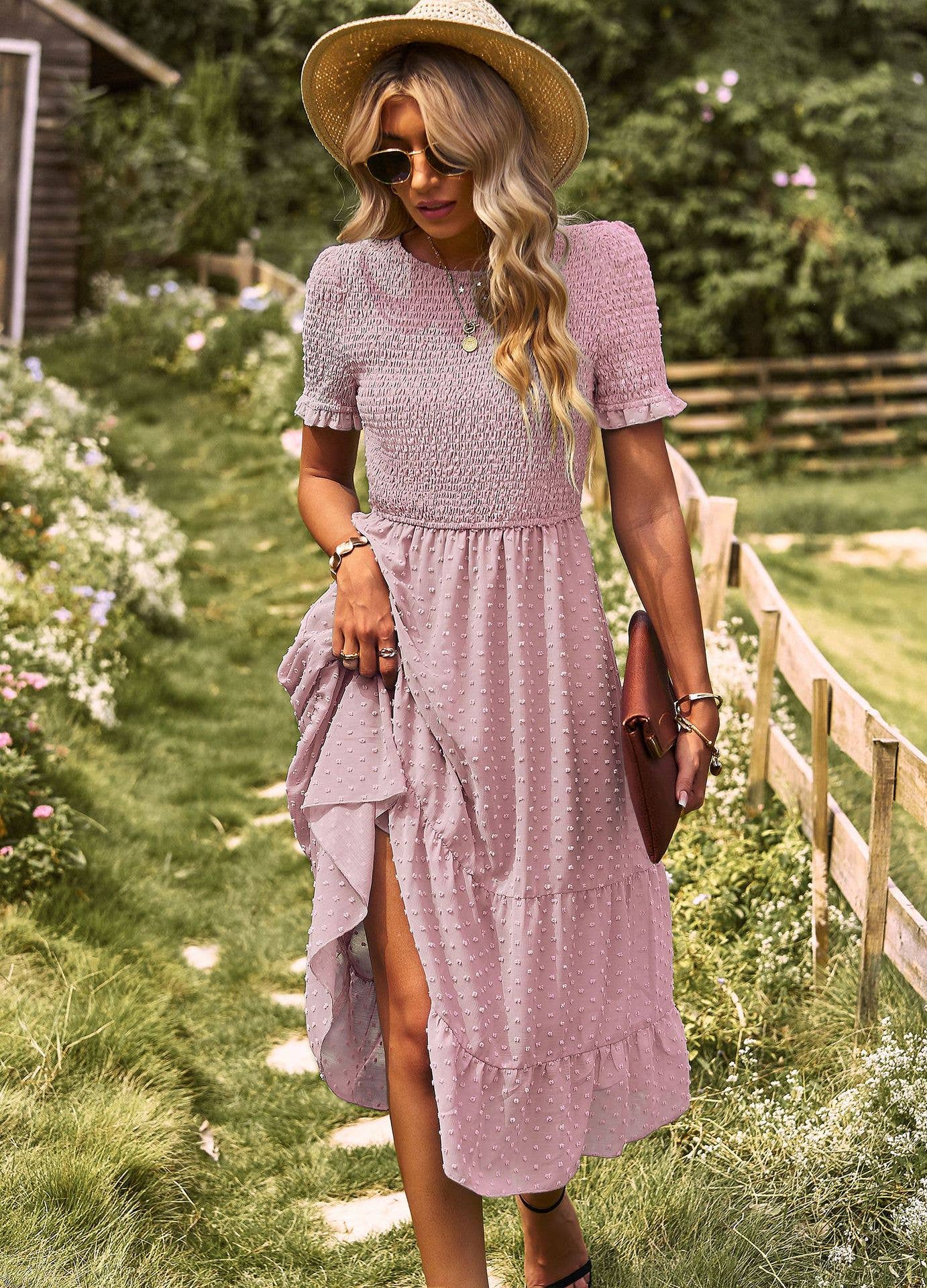 FLAUNTING A FLOWING SLIM-FIT DRESS