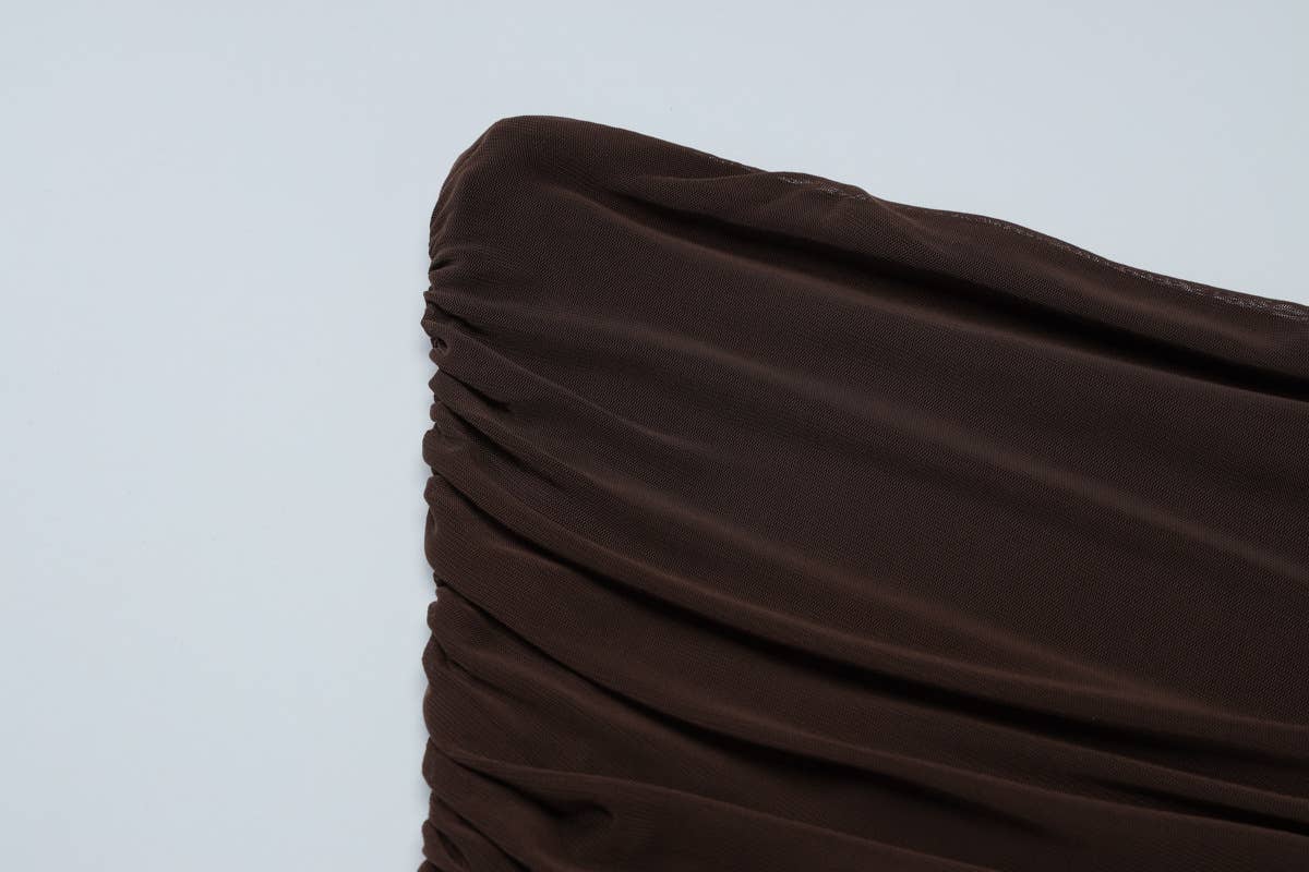 A strapless pleated patchwork gauze dress