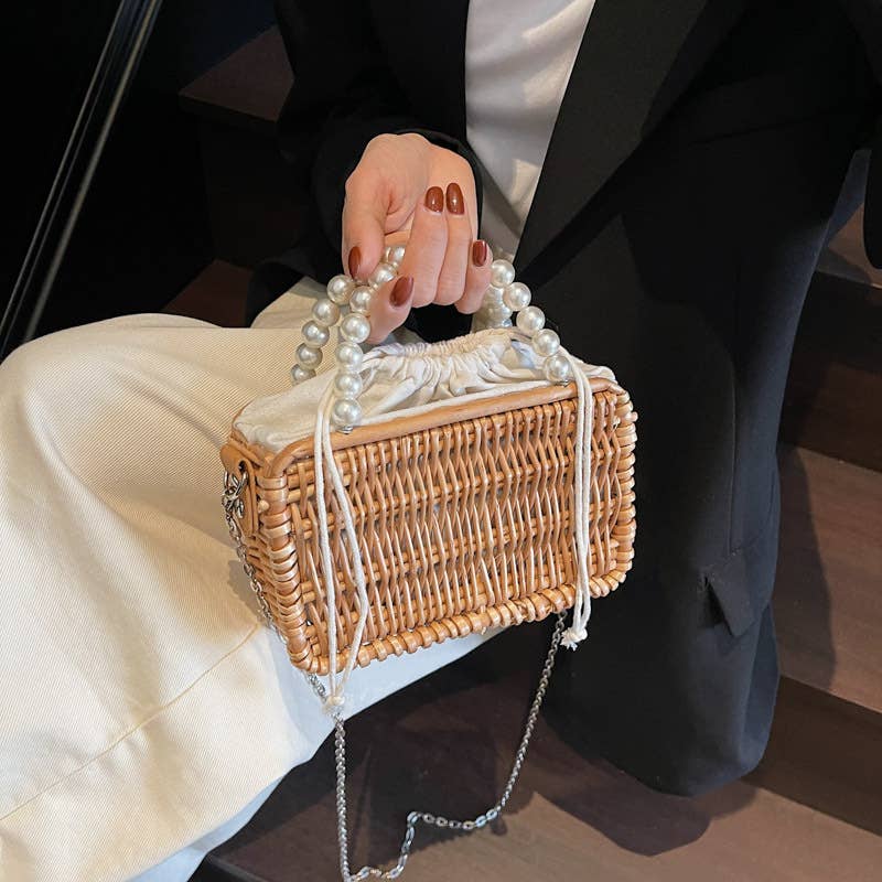 Fashionable perforated beach basket bag