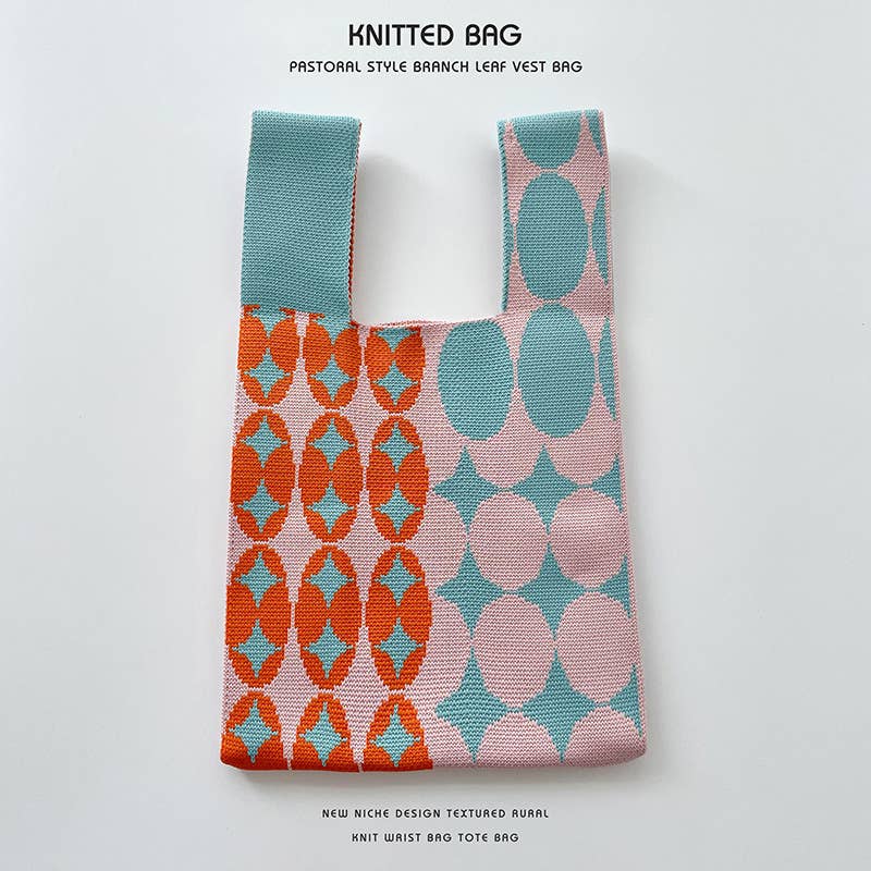 Heart-shaped color-blocked knitted handbag