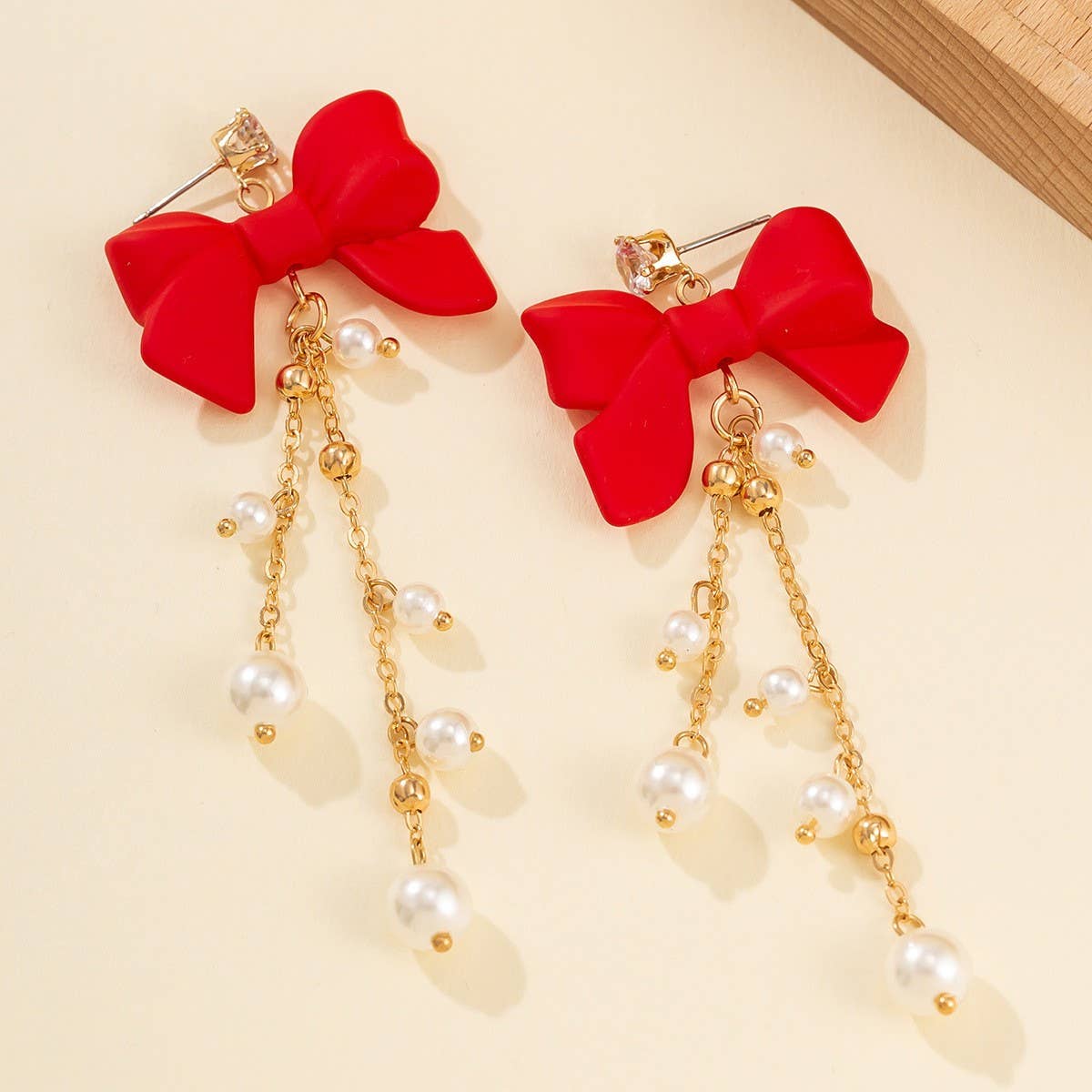 RED BOW EARRINGS WITH PEARL TASSELS_CWAJE1138