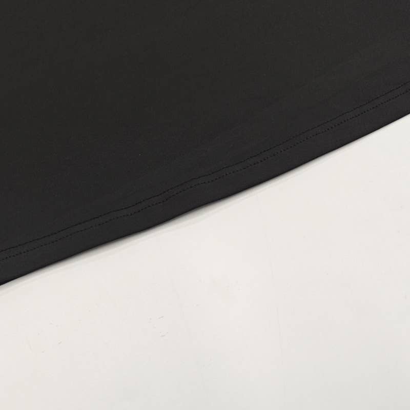 A cinched-neck backless and collared dress