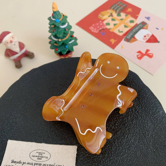 CWAHA07715_CHRISTMAS SMILEY GINGERBREAD CLAW HAIR CLIP