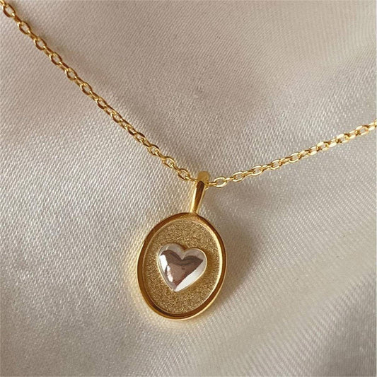 Women's two-tone heart oval pendant necklace