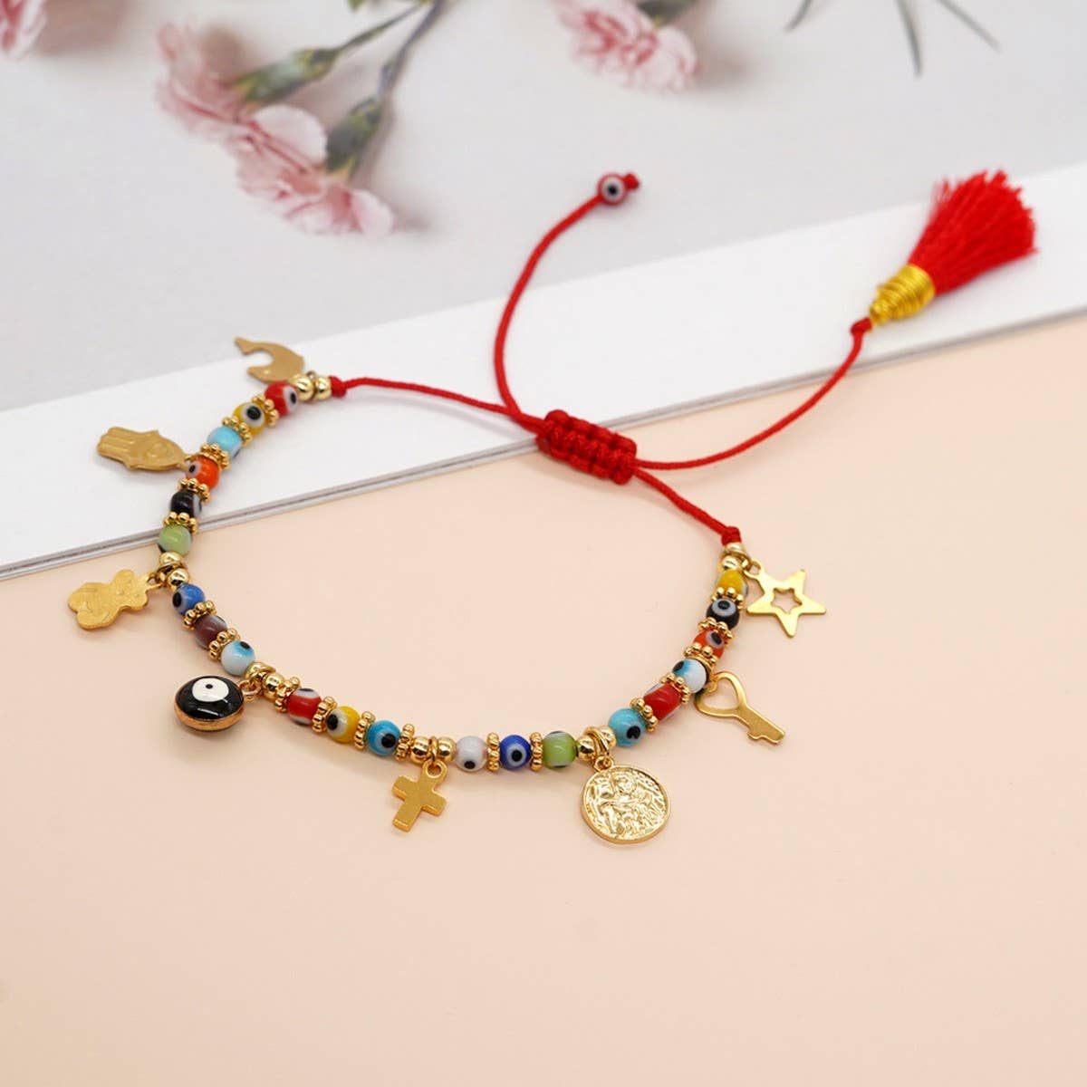 GLASS DEMON EYE METAL PENDANT TASSEL BRACELET