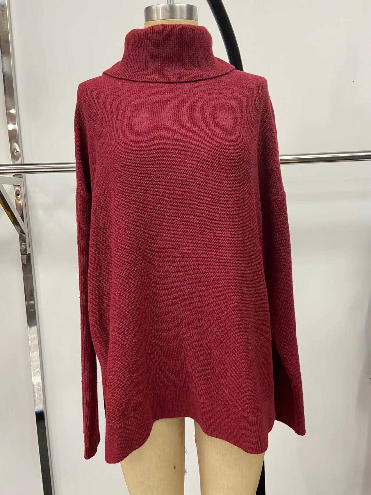 Bat sleeves and a cinched waist pullover sweater