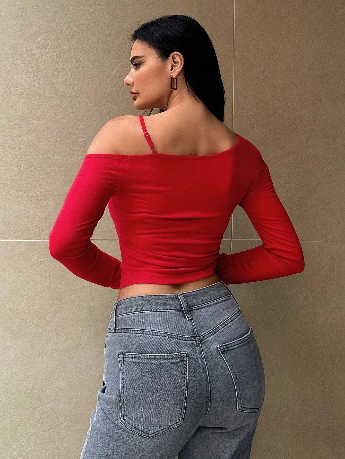 CROPPED TOP WITH SLOPING NECK AND CROP DESIGN