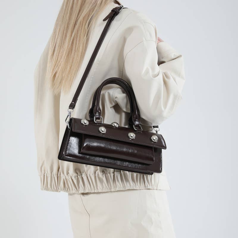 Fashionable rivet personalized hand-held tote bag