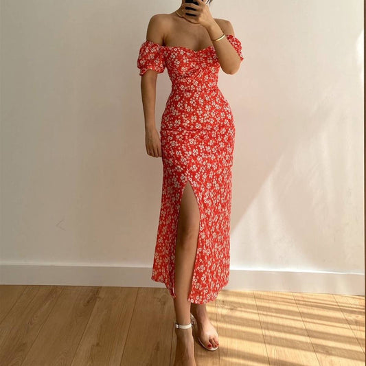 A floral off-shoulder pleated body-hugging dress