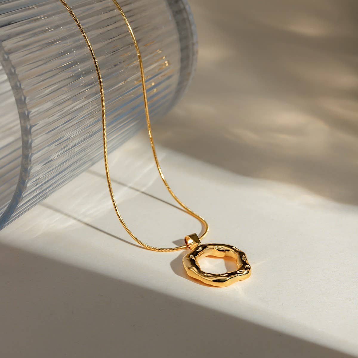 IRREGULAR HAMMERED ROUND SNAKE BONE NECKLACE