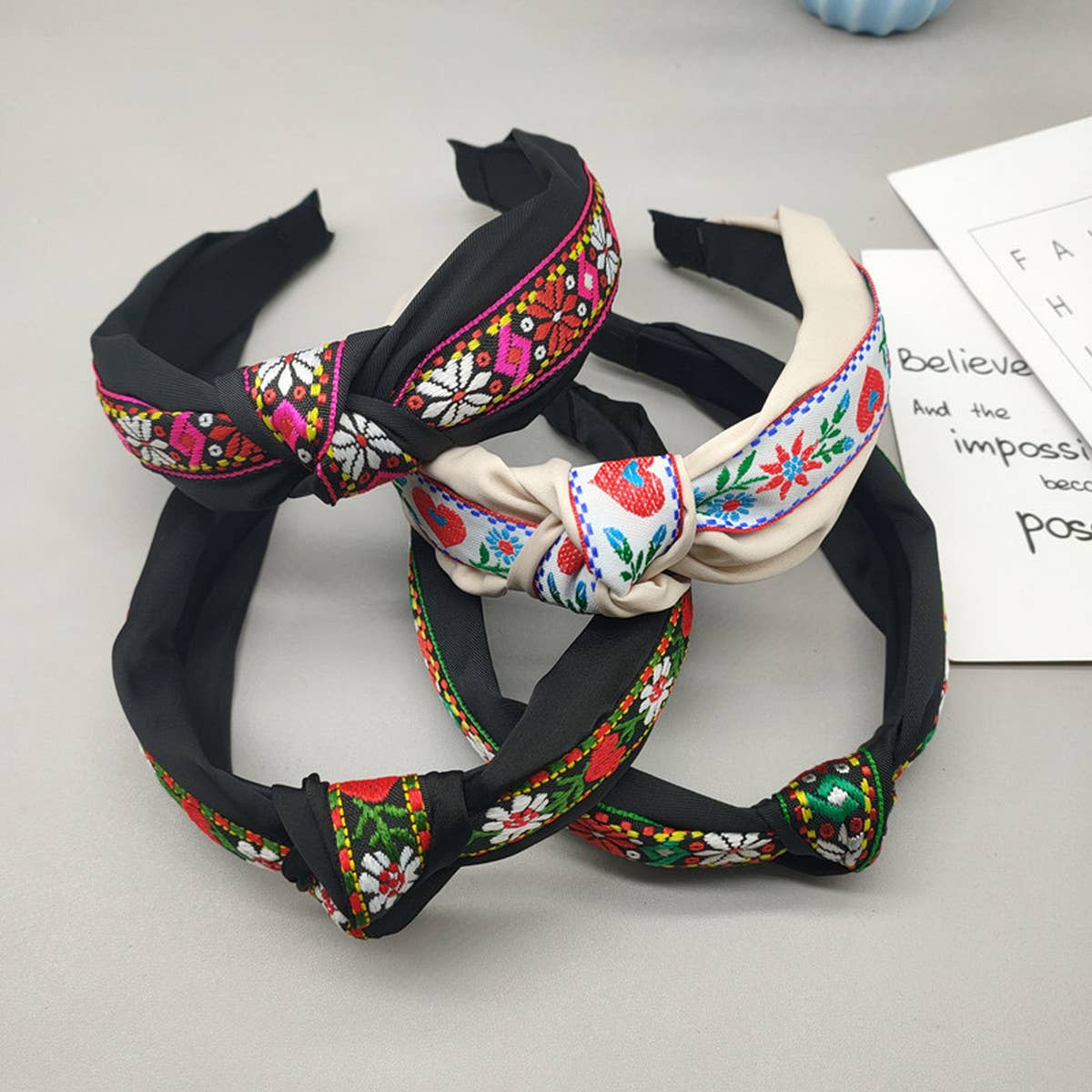 WIDE EMBROIDERED DOUBLE KNOT HEADBAND