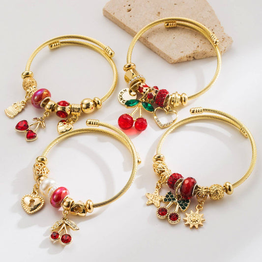 Gold Beaded Bracelet with Crystal Charms