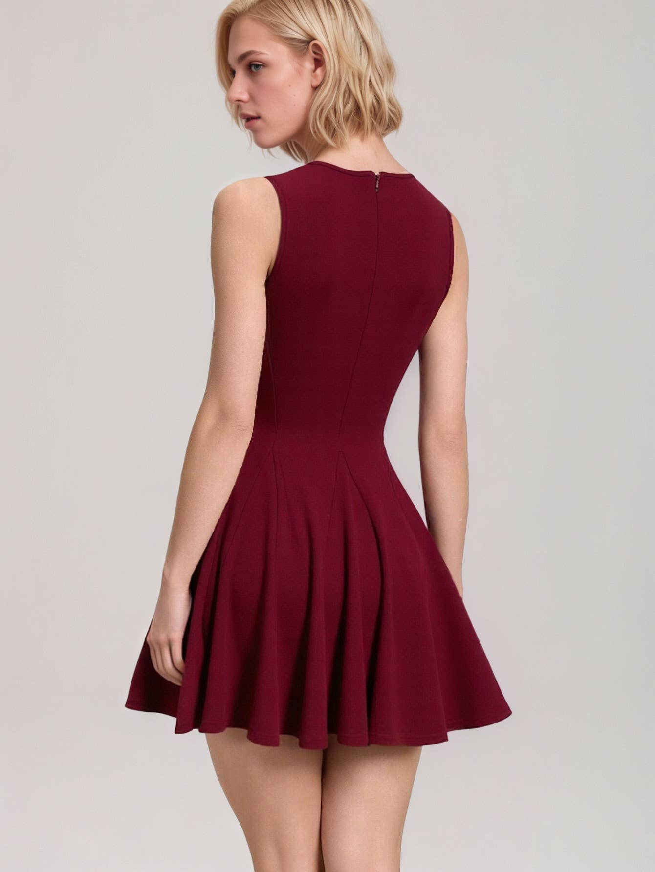 Fitted waist and bow tie sleeveless dress