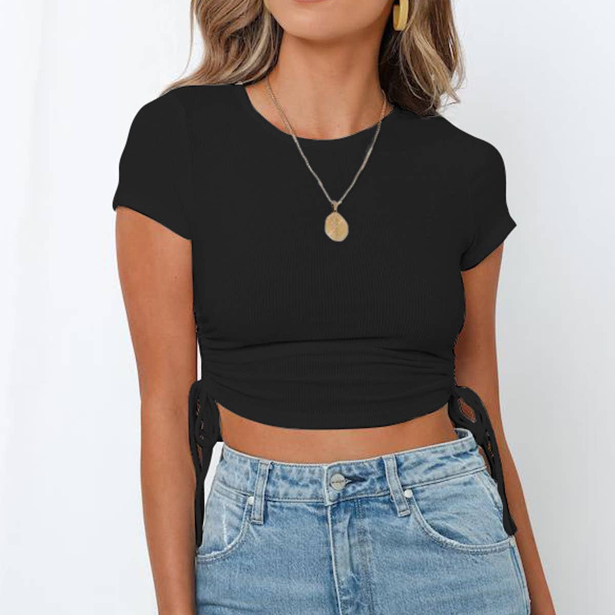 A drawstring, tie, crappy, and umbilical T-shirt