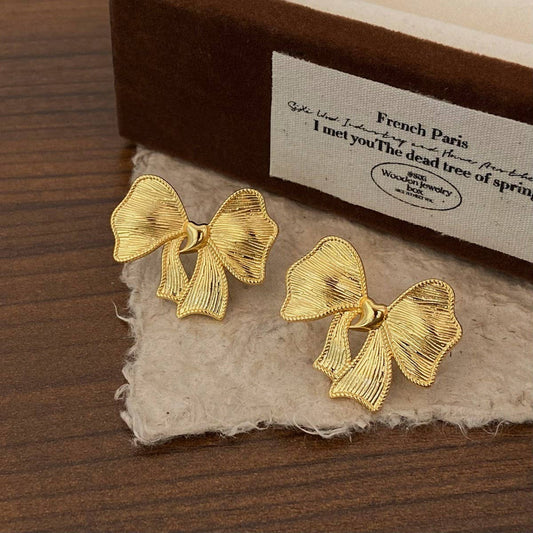NEW SIMPLE TEMPERAMENT BOW EARRINGS FOR WOMEN