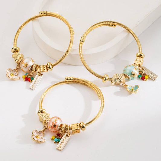 Trendy Beaded Steel Bracelet with Flower Charm