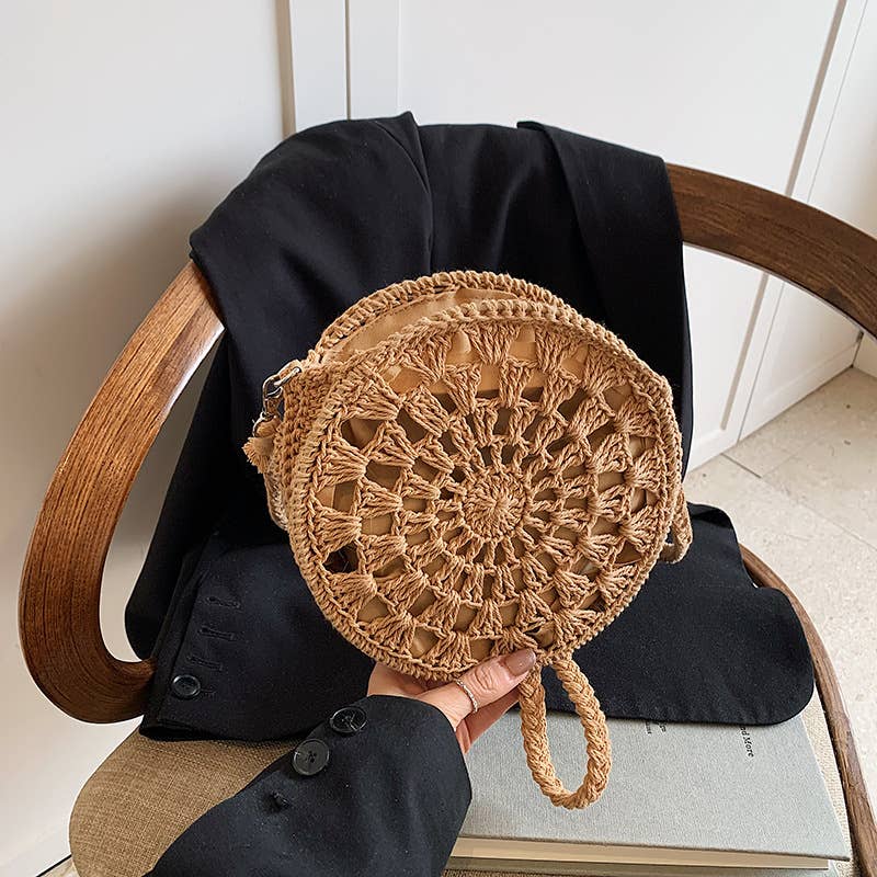 Fashionable hollowed-out woven crossbody bag