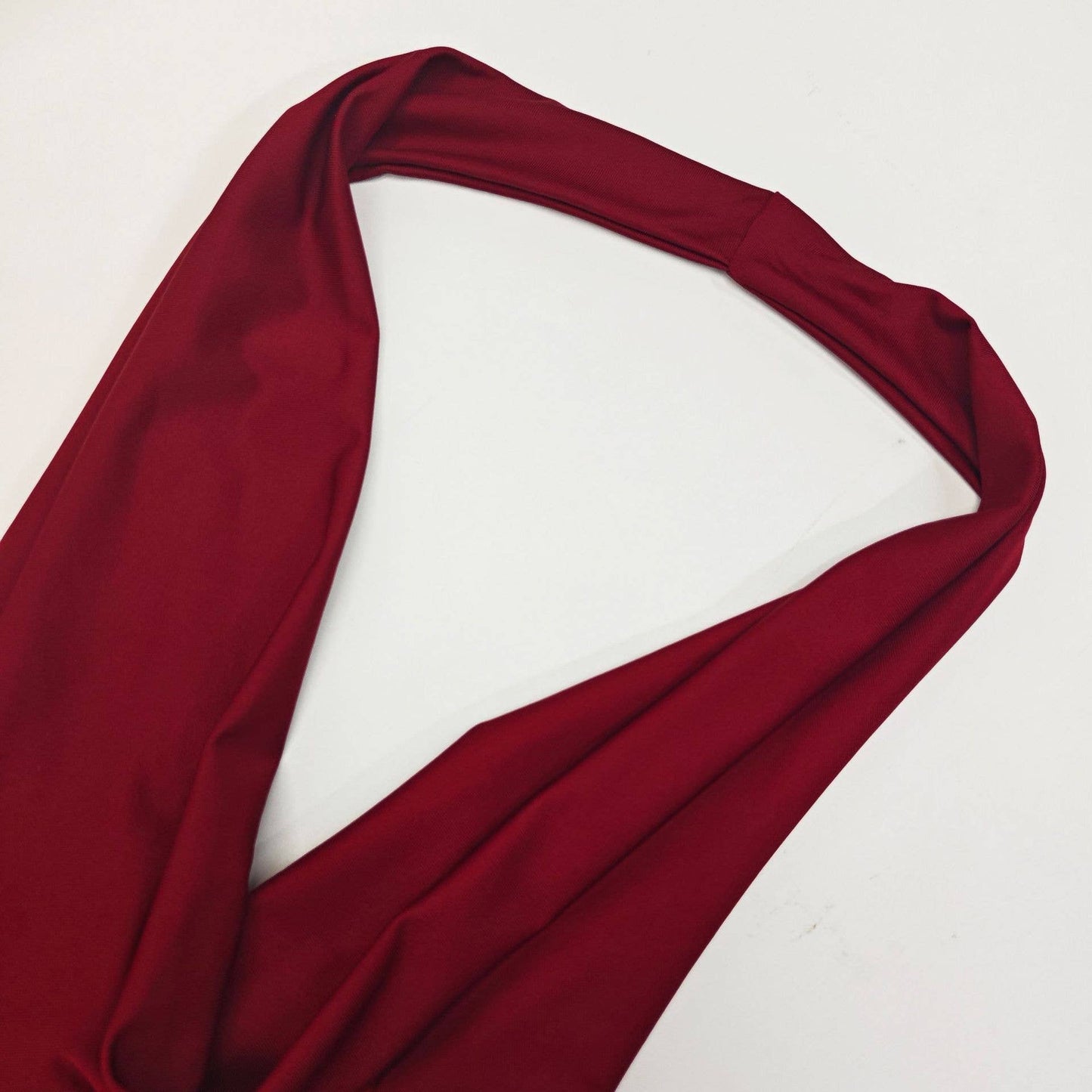 A cinched-neck backless and collared dress