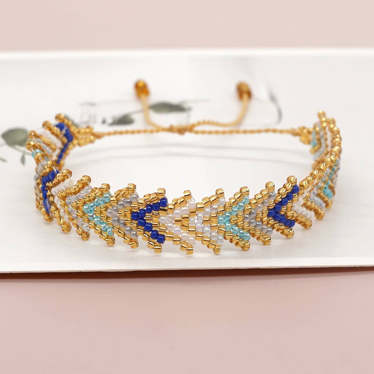 RICE BEAD HAND-WOVEN RAINBOW FLOWER BRACELET