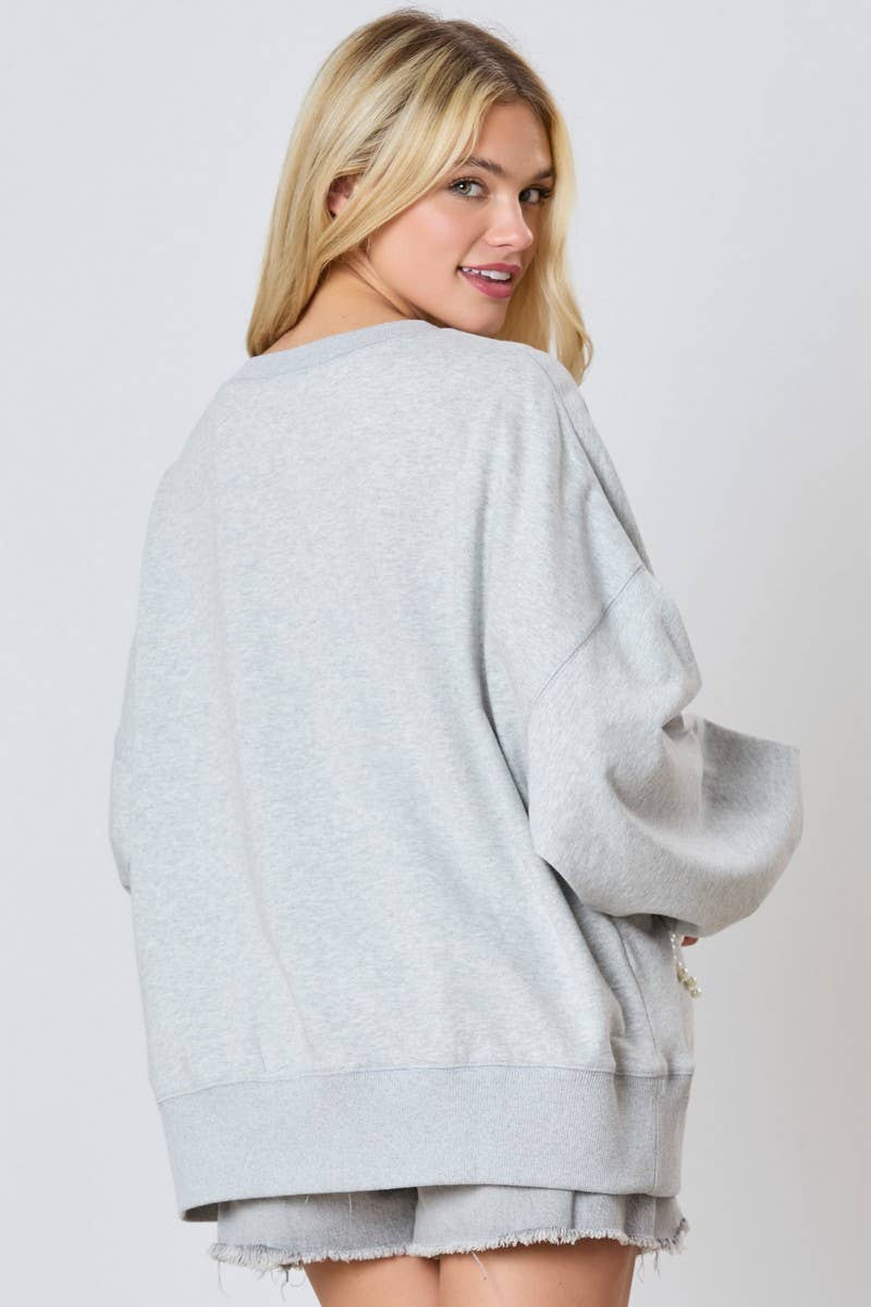 CWTBLL01261_PEARL BOW DETAIL LONG SLEEVE SWEATSHIRT