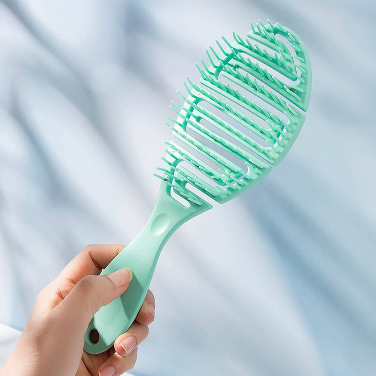 WOMEN AIR CUSHION HOLLOW MASSAGE COMB