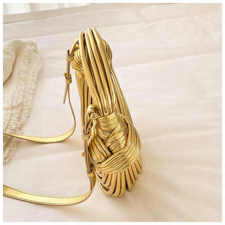 Metallic color striped appearance glossy handbag