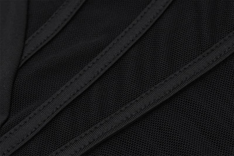 A corset, sheer, short, tight, cinched jumpsuit