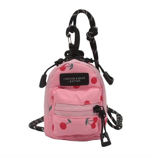 Printed mini lipstick headphones and small bag