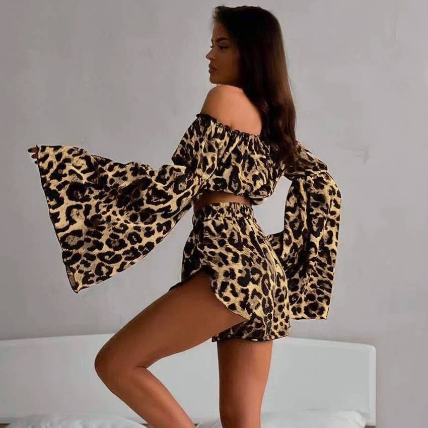 A one-shoulder top shorts and leopard print suit