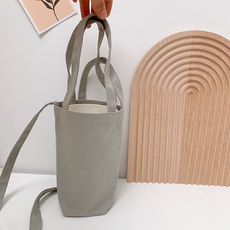 Portable and portable slanting water cup bag